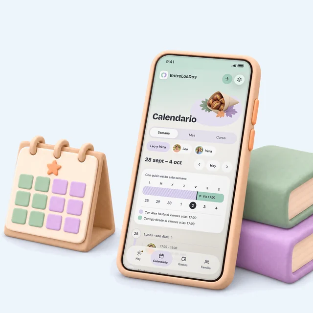La semana en el calendario de la app, en un móvil de arcilla apoyado en dos libros